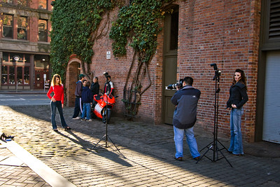 Ducati Desmosedici Motorcycle shoot.  Posing here is Krista with the back alley as her backdrop. http://www.jaytphotos.com/gallery/7135191_wgVCi#457506897_x6jM5